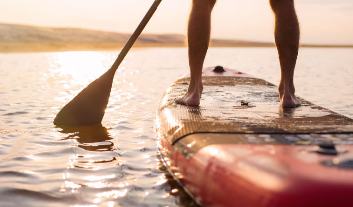 How Many Calories Do You Burn per Mile When Paddle Boarding?